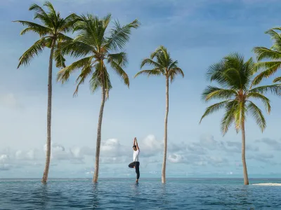 Alila-Kothaifaru-Maldives-Yoga-by-the-Beach