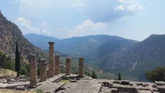 Mountains in Greece with Greek Ruins in the forground.